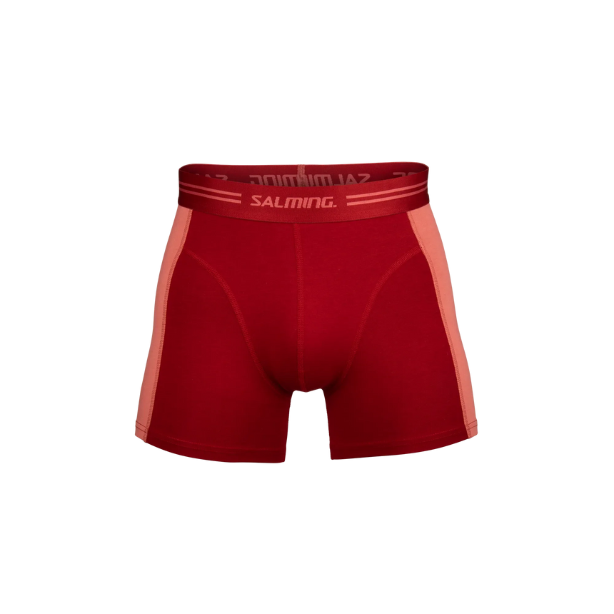 Red athletic salming boxers with a visible brand logo on a white background