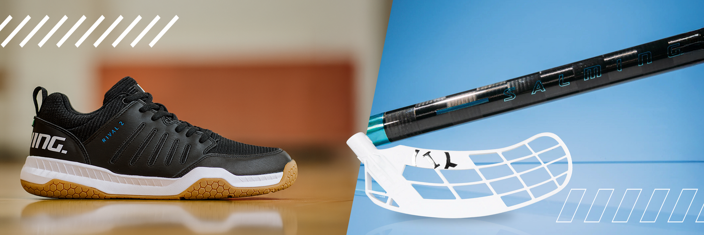 Black indoor shoe with white sole on a wooden floor, floorball stick with blue handle on a blue background