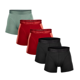 Set of men's boxer briefs in green, red, and black on a white background
