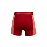 Red athletic shorts with a white background